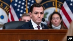 FILE - Chairman Mike Gallagher of Wisconsin leads a special House committee dedicated to countering China holds a hearing at the Capitol in Washington, Feb. 28, 2023.