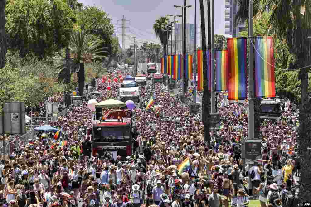 Participants march during the annual Pride Parade in Israel&#39;s Mediterranean coastal city of Tel Aviv.&nbsp;(Photo by RONALDO SCHEMIDT / AFP)