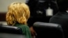 Colt Gray, charged as an adult with four counts of murder, sits in the Barrow County courthouse during his first appearance for the Wednesday shooting at Apalachee High School, in Winder, Georgia, Sept. 6, 2024.