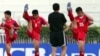 지난 2006년 6월 방콕에서 월드컵 아시아 예선 경기를 앞둔 북한 선수들이 몸을 풀고 있다. (자료사진)