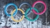 FILE – The Olympic rings are seen at Jeongseon Alpine Center, Pyeongchang, South Korea, Feb. 11, 2018. Canada declared its bid to host the 2026 Winter Olympics dead Monday after a failed referendum.