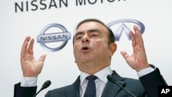 FILE - Nissan Motor Co. CEO Carlos Ghosn speaks during a press conference in Tokyo, Thursday, Oct. 20, 2016. (AP Photo/Shizuo Kambayashi)