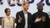Britain's Meghan, Duchess of Sussex, Prince Harry, Duke of Sussex, and Nigeria Chief of Defense Staff Christopher Musa after a charity polo game at the Ikoyi Polo Club in Lagos on May 12, 2024.