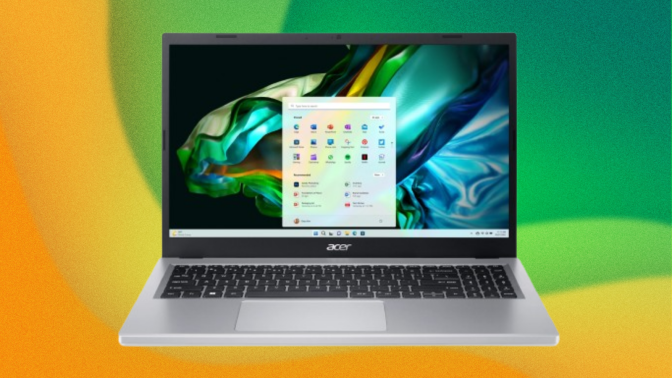 the acer aspire 3 against a green and yellow abstract background