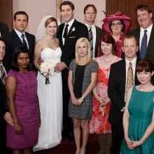 The cast of "The Office" posing for a group wedding photo while filming the "Niagara" episode.