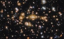 A spectacular view of galaxies captured by the James Webb Space Telescope in deep space, billions of light-years away.