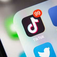 TikTok and Facebook application on screen Apple iPhone XR