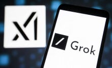 A smartphone displays the word "Grok", while the X logo is visible in the background.