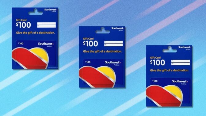 three $100 southwest airlines gift cards on a blue background