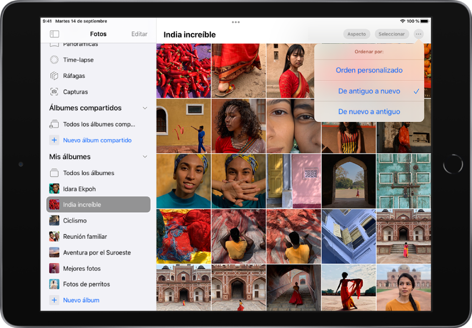 La barra lateral Fotos está abierta en la parte izquierda de la pantalla. Debajo del encabezado “Mis álbumes”, el álbum titulado “India increíble” está seleccionado. El resto de la pantalla muestra miniaturas de fotos del álbum en una cuadrícula. En la esquina superior derecha de la pantalla, el botón Más está seleccionado y se muestran las opciones de ordenación: “Orden personalizado”, “De antiguo a nuevo” y “De nuevo a antiguo”. La opción “De antiguo a nuevo” está seleccionada.