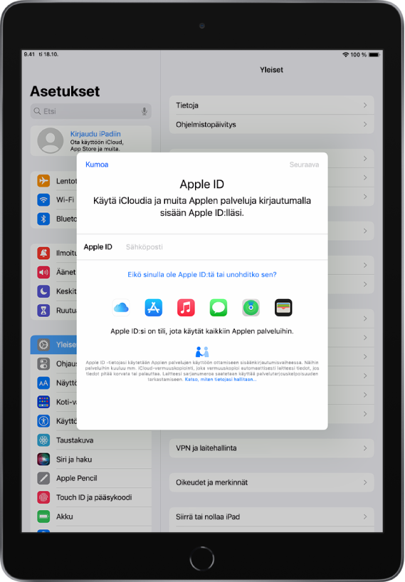 Asetukset-näyttö ja Apple ID -kirjautumisikkuna näytön keskellä.