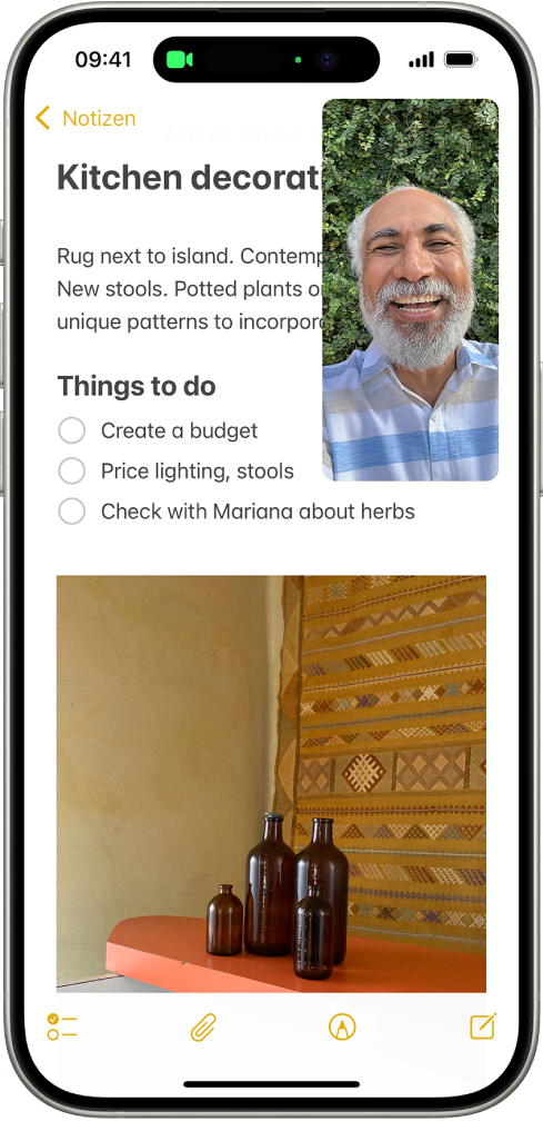 Eine aktive FaceTime-Konversation mit einer Notiz zum Thema Küchendekoration, die den übrigen Bildschirm füllt.