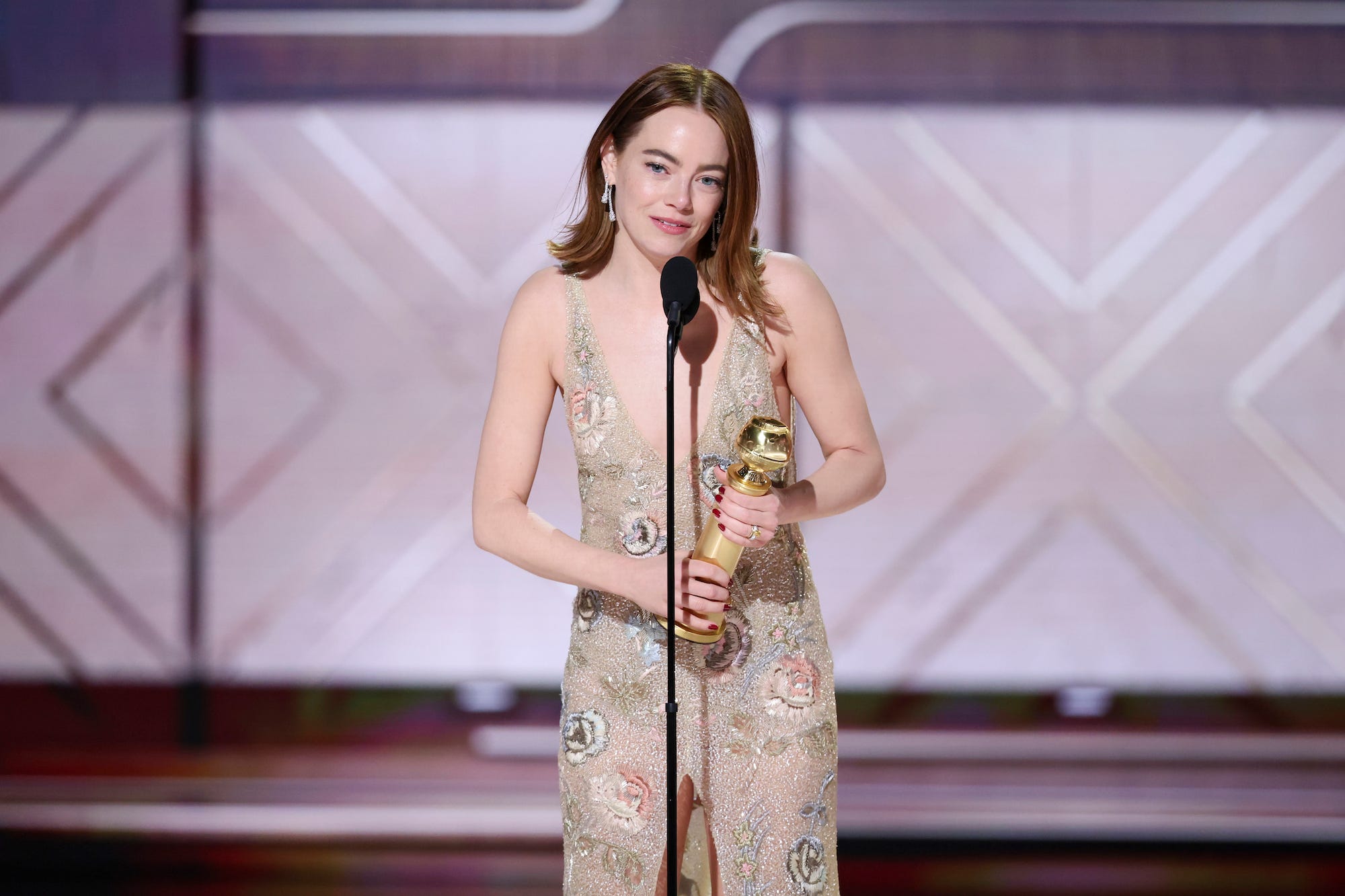 emma stone accepts the award for best performance by a female actor in a motion picture musical or comedy for "poor things" at the 81st golden globe awards held at the beverly hilton hotel on january 7, 2024 in beverly hills, california photo by rich polkgolden globes 2024golden globes 2024 via getty images