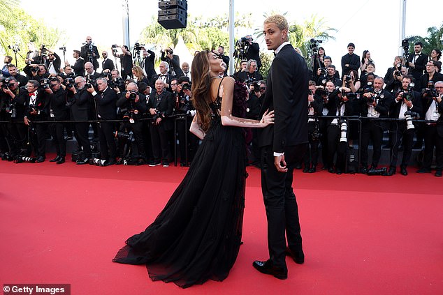 The happy couple put on a sweet display and looked every inch the perfect couple as they struck up a pose for the cameras