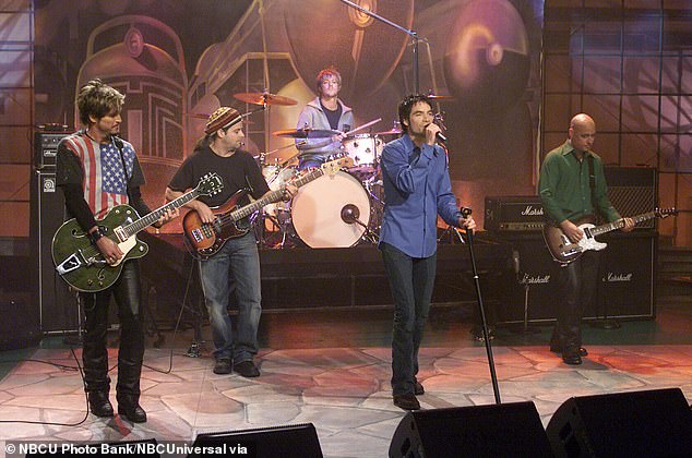 'I always tried to pull him closer but he had a vision of his own,' Monahan wrote of Colin, seemingly alluding to the bassist's 2003 departure; Colin (L) performs with Train on The Tonight Show With Jay Leno in 2001