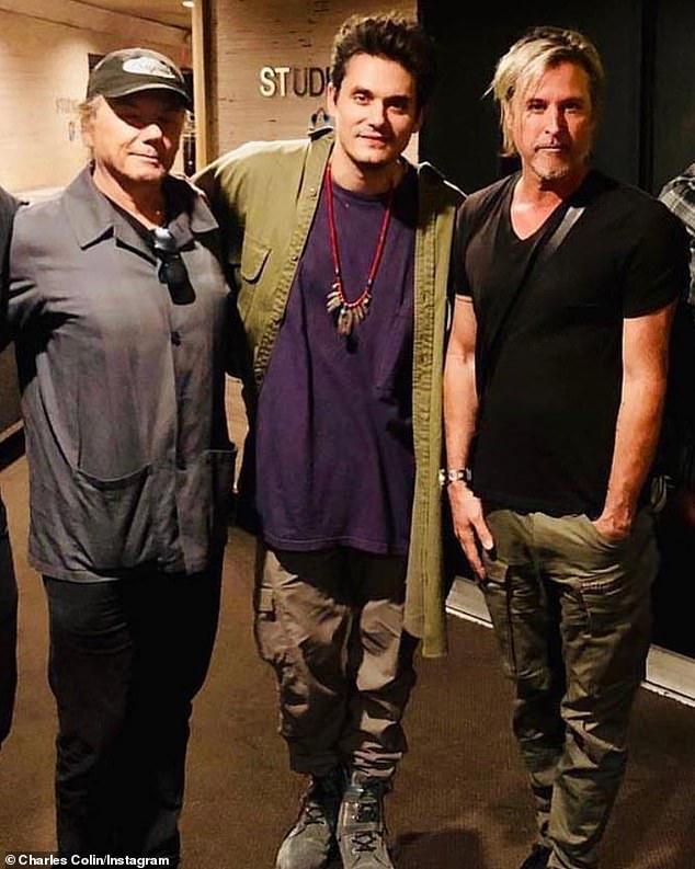 Colin was reportedly house sitting for a friend in Belgium, and his body was not discovered until they returned home five days ago; Colin (R) with fellow accomplished musician John Mayer (center) several years ago