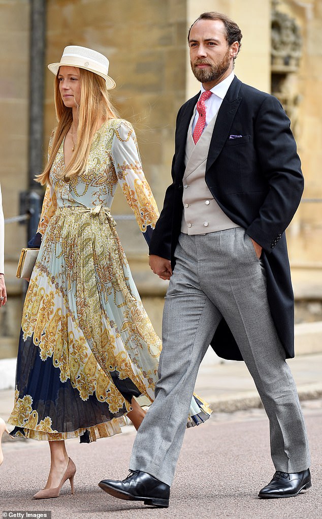 James credits Ella for introducing him to his wife Alizee, as the pair met when the pup 'made a beeline' for her in 2018. Above: The pair pictured in 2019