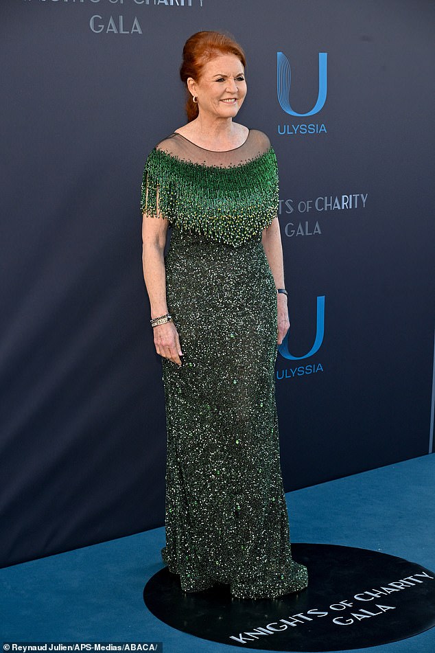 Sarah Ferguson also dressed to the nines for the occasion, sporting an emerald green gown covered in sequins