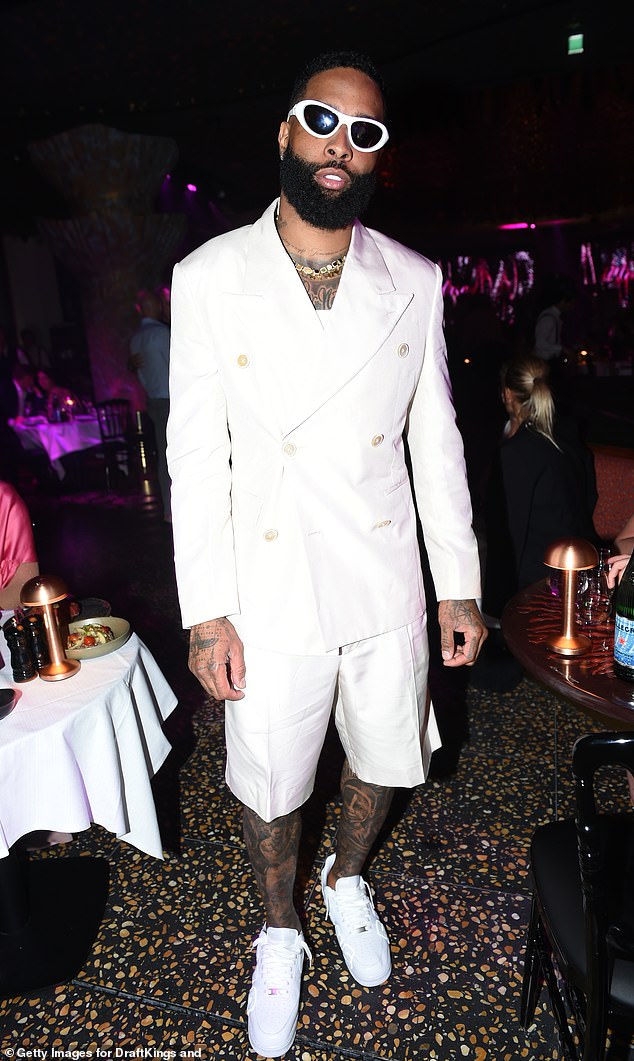 Odell Beckham Jr. looked stylish in a white shorts suit and trainers