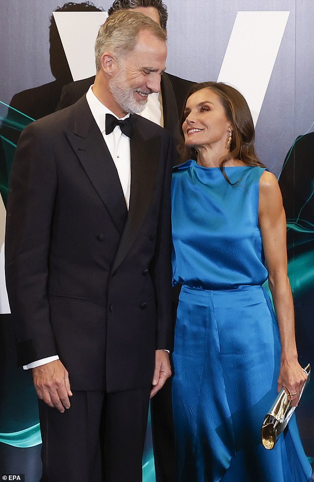 Queen Letizia and King Felipe VI (pictured in July 2023) are living separately and just 'keeping up appearances' in public, a veteran journalist has sensationally claimed