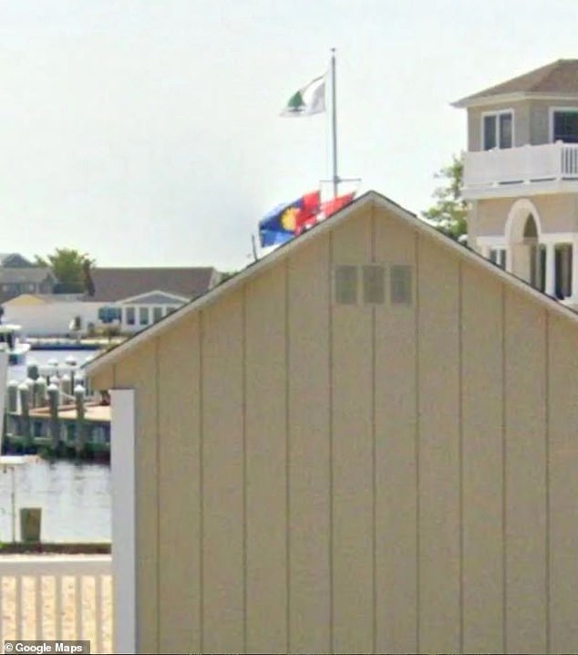 A photo from Google Maps' street view shows the pine tree 'Appeal to Heaven' flag flying outside of Alito's New Jersey vacation home in August 2023