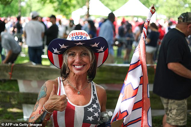 Tina Forte wearing a Trump cowboy hat a patriotic top in the South Bronx. The Republican is running against Rep. Alexandria Ocasio-Cortez in NY-14