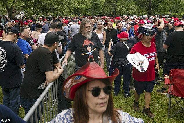 Supporters of the Republican presidential candidate former President Donald Trump gather for a campaign rally in the Bronx borough of New York