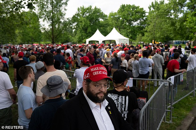 Lines form to get into the rally. Trump believes he can do what only Ronald Reagan has done in recent history