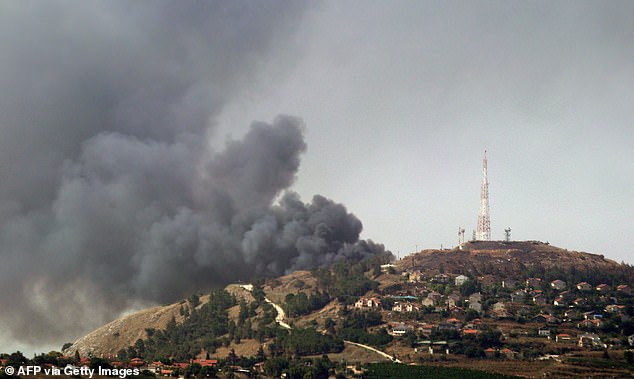 A photo taken from the southern Lebanese border town of Marjayoun on June 14, 2024 shows smoke billowing from Metullah on the Israeli side after being targeted by rockets from Lebanon