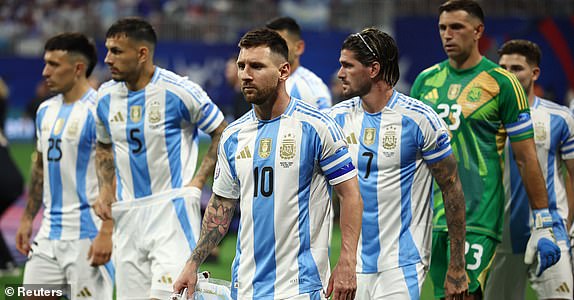 Soccer Football - Copa America 2024 - Group A - Argentina v Canada - Mercedes-Benz Stadium, Atlanta, Georgia, United States - June 20, 2024 Argentina's Lionel Messi walks out before the match REUTERS/Agustin Marcarian