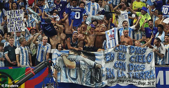 Soccer Football - Copa America 2024 - Group A - Argentina v Canada - Mercedes-Benz Stadium, Atlanta, Georgia, United States - June 20, 2024 Argentina fans celebrate after the match REUTERS/Agustin Marcarian