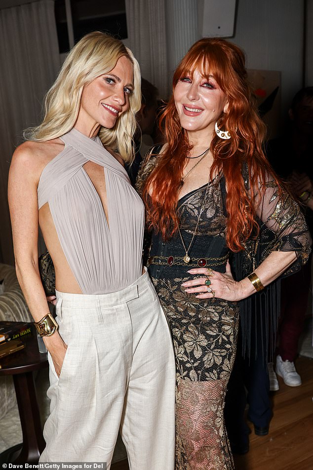 Poppy was also joined by makeup mogul pal Charlotte Tilbury, 51, who wowed in a semi-sheer black and gold floral ensemble