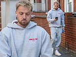 Sam Thompson looks downcast as he leaves the London home he shares with girlfriend Zara McDermott after a weekend of 'crisis talks'