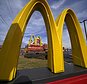 FILE - McDonald's restaurant signs are shown in in East Palestine, Ohio, Feb. 9, 2023. McDonald's reports earning on Monday, July 29, 2024.(AP Photo/Gene J. Puskar, File)