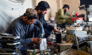 Treasure in trash: Afghans hunt for gold in discarded electronics