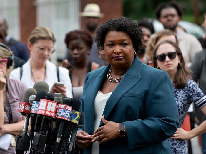 Democratic gubernatorial candidate Stacey Abrams speaks to the media during a press conference