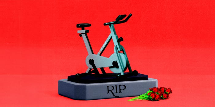 Photo illustration of a tombstone with a Peloton bike.