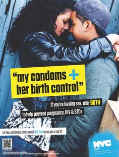 a man and woman hugging each other in front of a wooden fence with the words my condoms her birth control