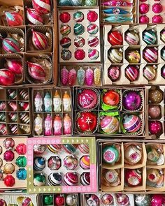 many different types of ornaments are in boxes