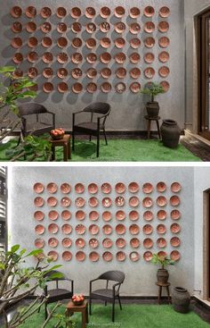 the wall is made out of circles and has chairs in front of it with plants growing on them