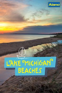 the lake michigan beaches sign is posted in front of some water and grass at sunset