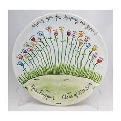 a plate with flowers on it that says, what you got helping us today?