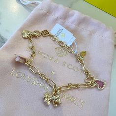 Brand New In Gift Box And Dust Bag. On Hand And Actual Item Is Pictured. Loveshackfancy Kendra Scott Collab Gold Charm Bracelet Thread Bracelets With Gold, Birthday Gifts To Girlfriend, Chunky Gold Bracelet Stack, Thoughtful Birthday Gifts For Girlfriend, Gold Charms Bracelet, Kendra Scott Charm Bracelet, Gold Bracelet Pandora, Soft Gold Jewelry, Things To Make Girlfriend