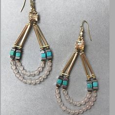 two pairs of earrings with beads and stones