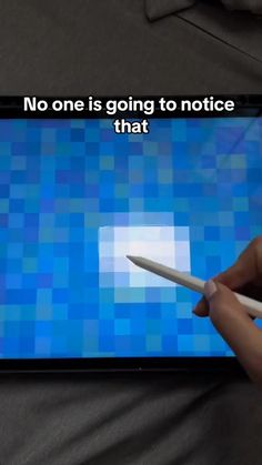 a person holding a pencil in front of a computer screen that says, no one is going to notice that