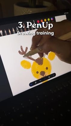 a person is using a pen to draw a cartoon bear on a sheet of paper