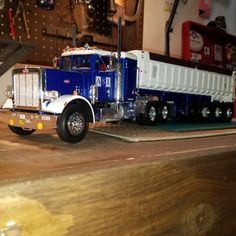a toy semi truck is on the table