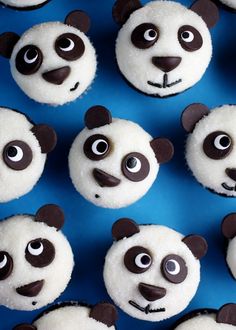 there are many panda cupcakes on the table