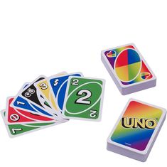 four uno card game cards with numbers and colors