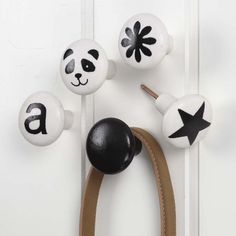 a door handle with black and white decorations on it